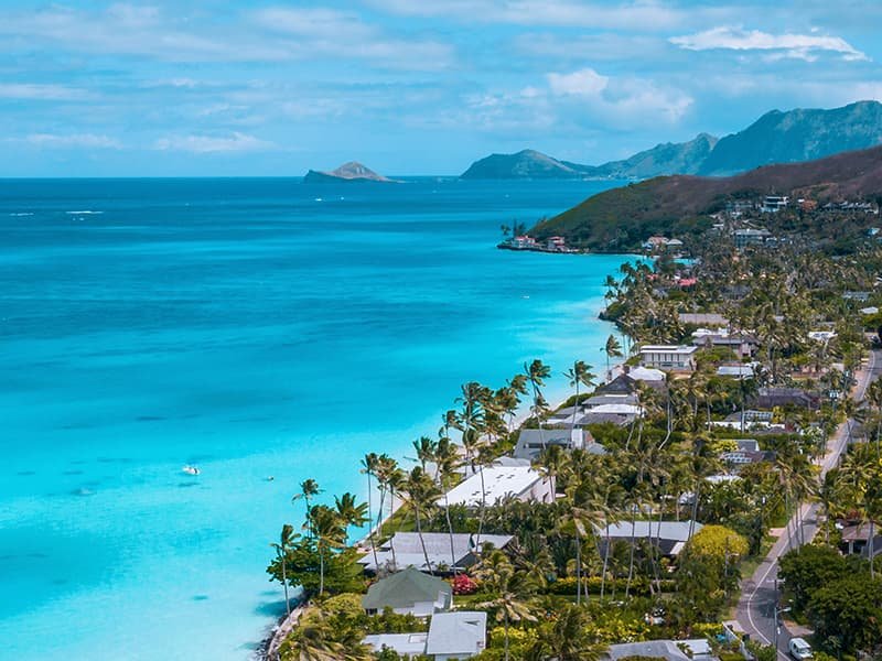 An aerial view of Fiji and the ocean on a sunny day