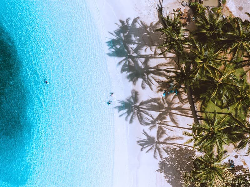 people playing on the beach in Hawaii