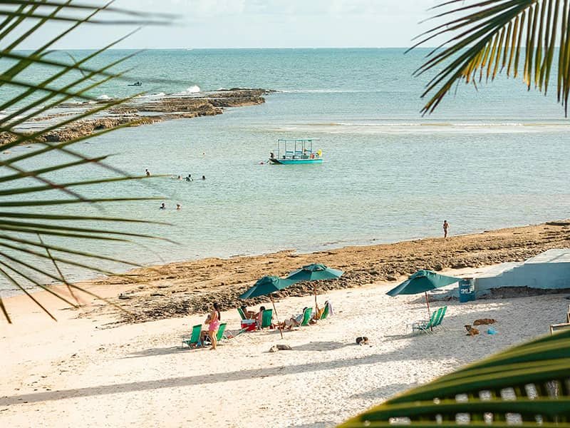 People on a beach in Tanzania